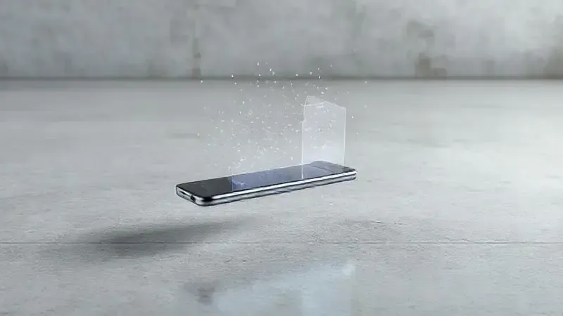 Ilustração conceitual de celular caindo, protegido por uma aura que simboliza a absorção de impacto da capinha.